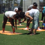 Some pose adjusting to individualize the yoga practice - Breathe Brownsville Brooklyn Yoga Festival